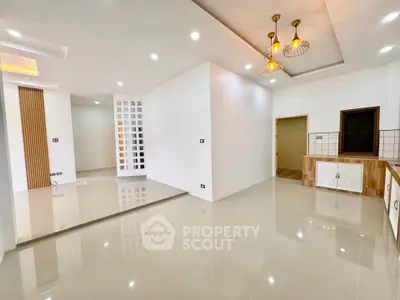 Spacious modern living room with elegant lighting and open layout