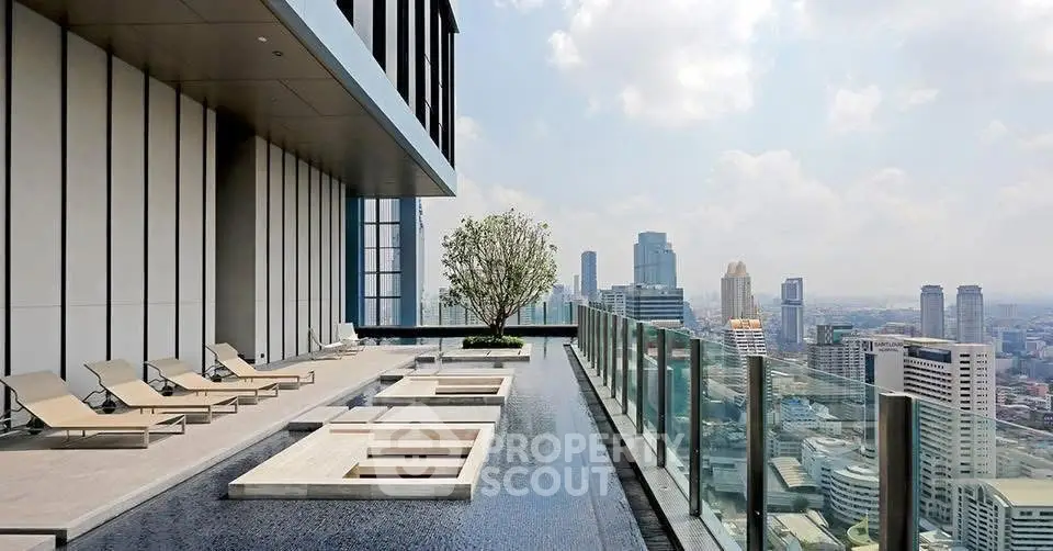 Luxurious rooftop pool with stunning city skyline views and modern lounge chairs.