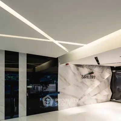 Modern building entrance with sleek design and stylish lighting