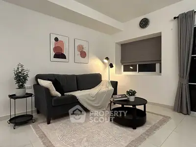 Cozy modern living room with stylish decor and comfortable seating