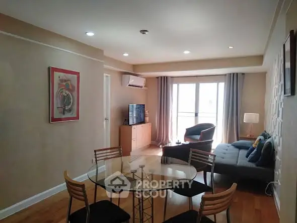 Spacious living room with modern decor and natural light