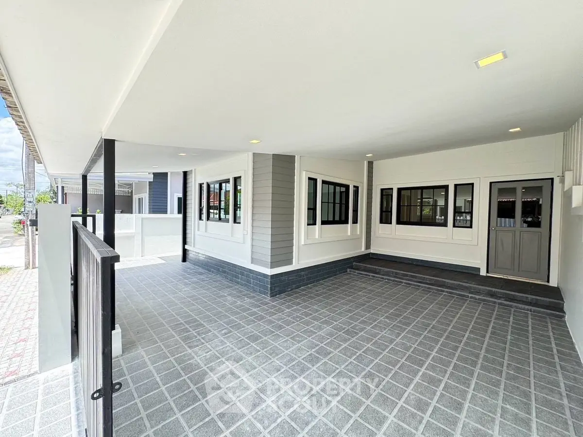 Spacious covered parking area with modern design and tiled flooring