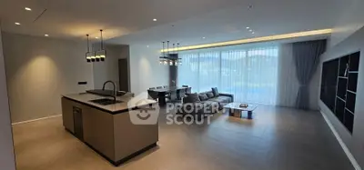 Luxurious open-plan living room with modern kitchen and stunning view