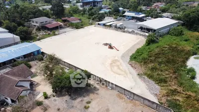 Expansive vacant land plot ideal for development in a serene neighborhood setting.