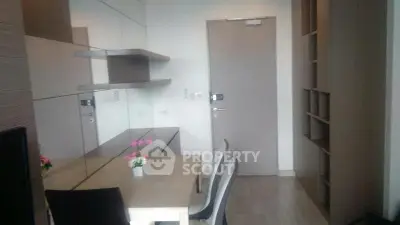 Modern apartment interior with dining area and stylish shelving