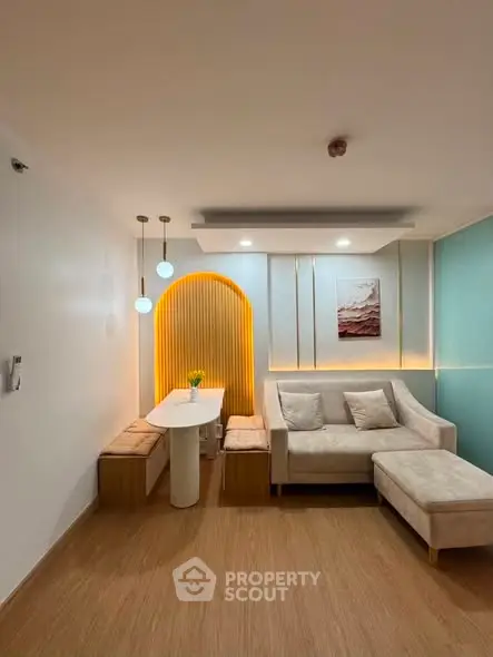 Modern living room with stylish lighting and cozy seating area