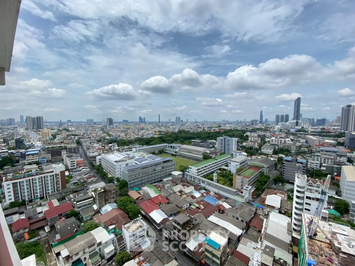Stunning cityscape view from high-rise building showcasing urban skyline and expansive horizon.