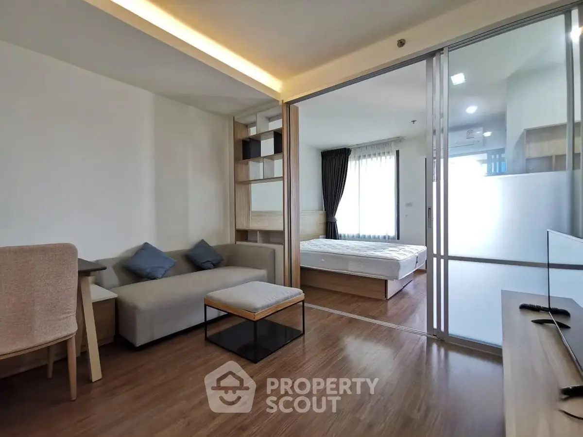 Modern studio apartment with open layout and stylish furnishings