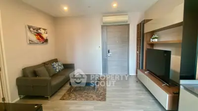 Modern living room with sleek furniture and stylish decor