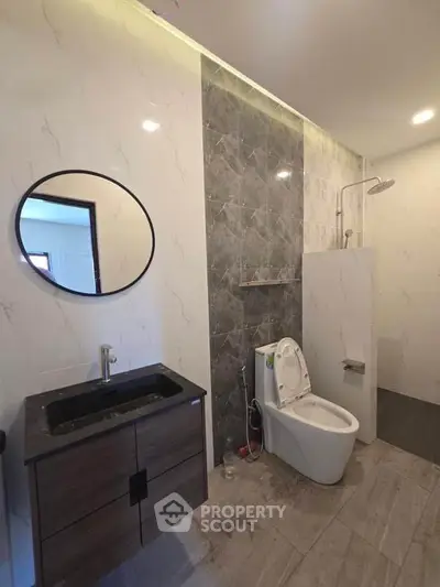 Modern bathroom with sleek fixtures and stylish tile design