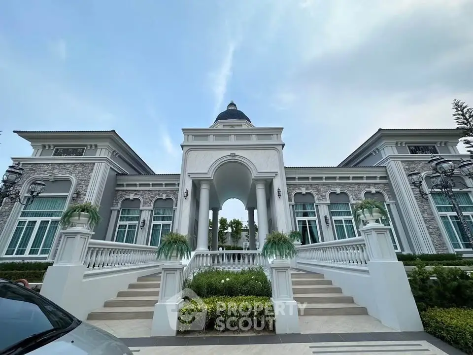 Stunning luxury mansion with grand entrance and elegant architecture