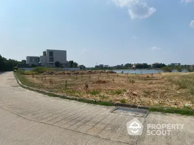 Prime vacant land with potential for development near serene water view