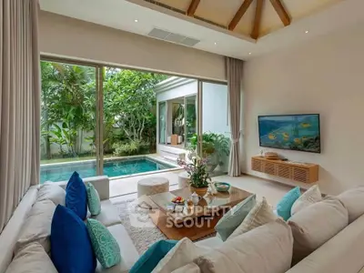 Luxurious living room with pool view and elegant decor in tropical villa