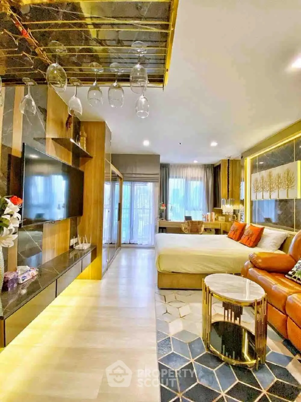 Luxurious open-concept living room with modern decor and elegant lighting