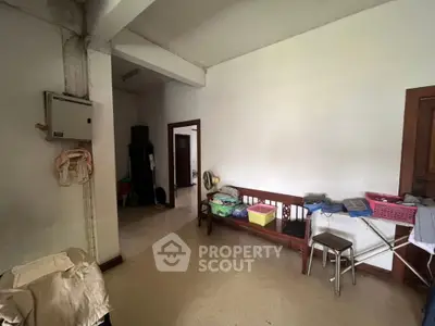 Spacious unfurnished living area with high ceilings, ample natural light, and potential for creative interior design, ideal for personalization.