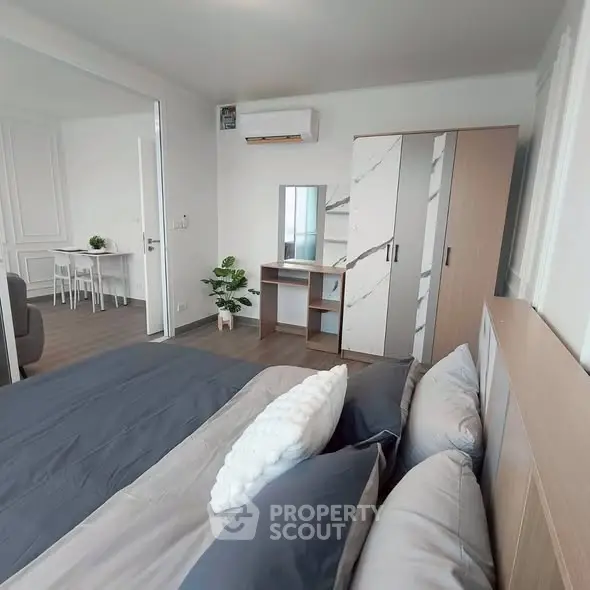 Modern bedroom with stylish furniture and cozy ambiance