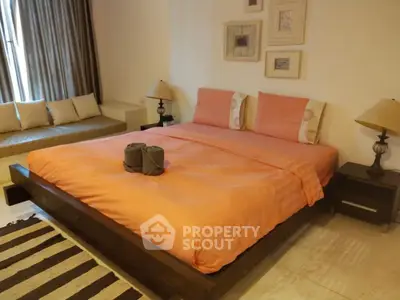 Cozy bedroom with stylish decor and large bed in modern apartment