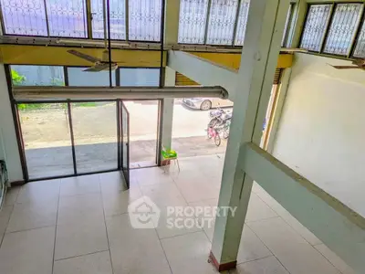 Spacious commercial space with large windows and open layout, ideal for business opportunities.