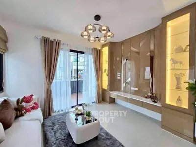 Luxurious living room with modern decor and elegant lighting