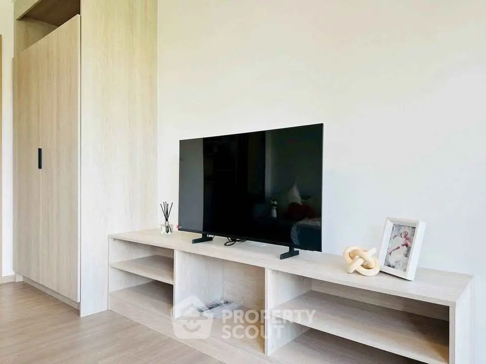 Modern living room with sleek TV stand and minimalist decor