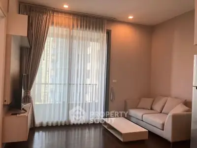 Modern living room with elegant curtains and cozy sofa in a stylish apartment.