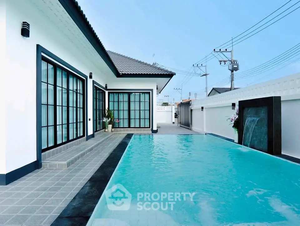 Modern villa with sleek pool and stylish exterior design, perfect for luxury living.