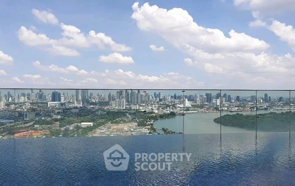 Stunning rooftop infinity pool with panoramic city skyline view