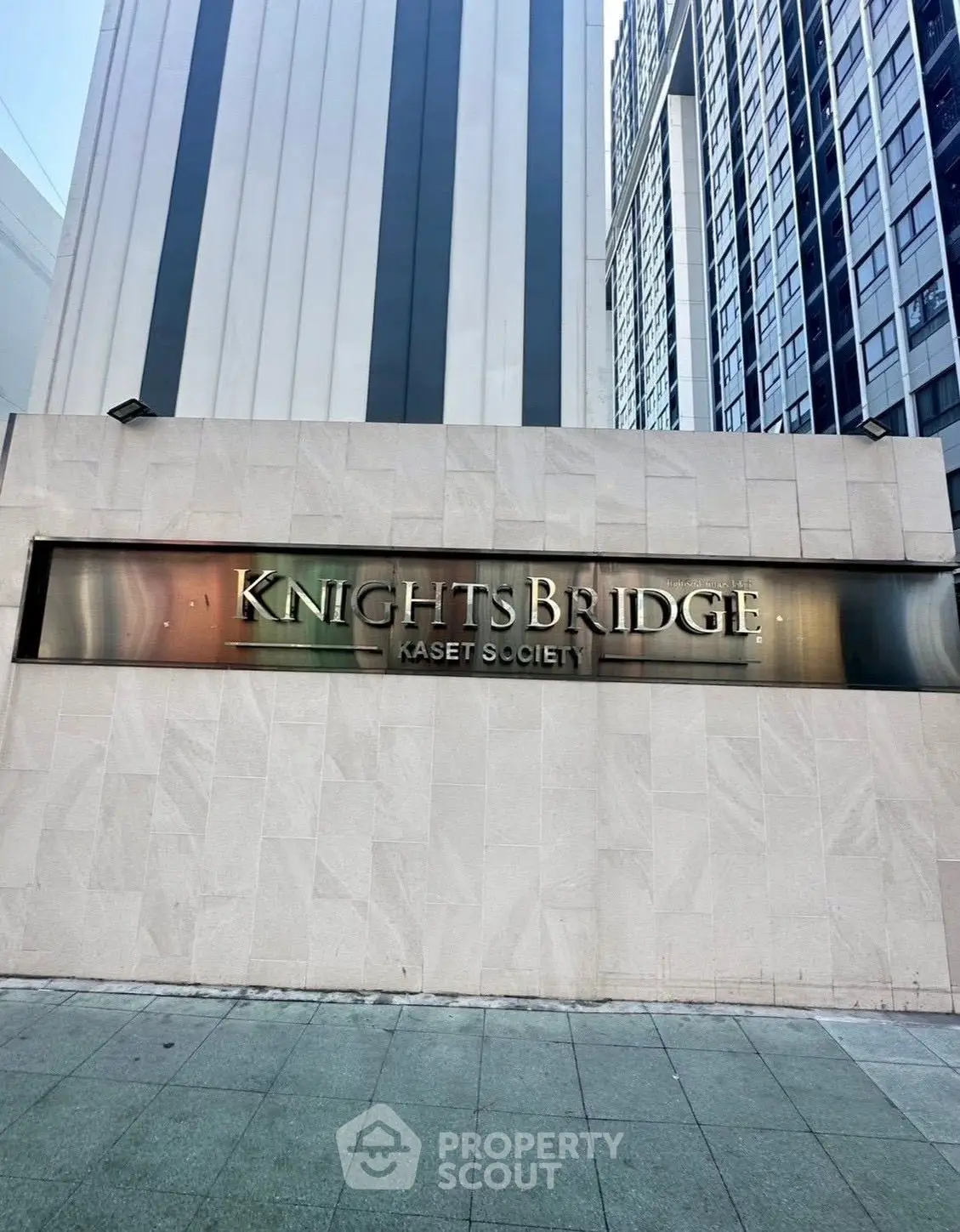 Modern Knightsbridge Kaset Society building exterior with sleek design and urban appeal.