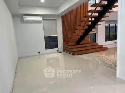 Modern interior with sleek staircase and polished floors in a contemporary home