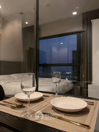 Elegant dining setup with city view in modern apartment