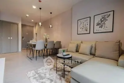 Modern living room with stylish decor and cozy seating area in a contemporary apartment.