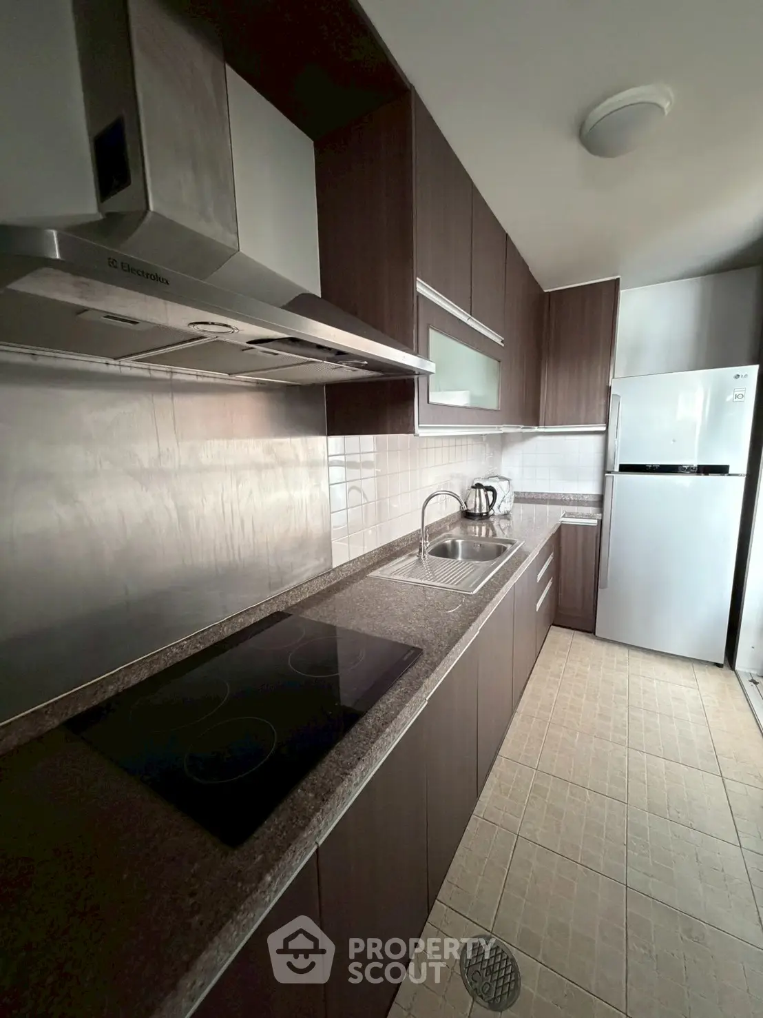 Modern kitchen with sleek cabinetry and stainless steel appliances