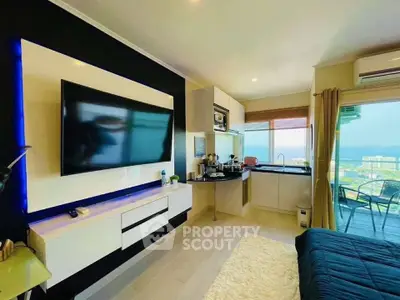 Modern studio apartment with open kitchen and stunning balcony view