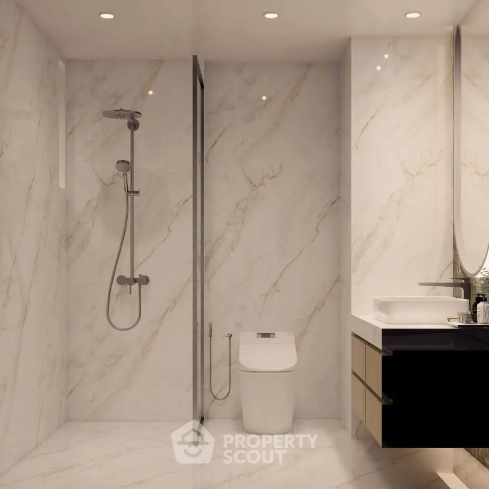 Luxurious modern bathroom with marble walls and sleek fixtures
