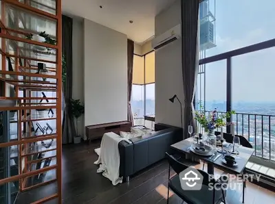 Luxurious high-rise apartment with stunning city view and modern interior design.