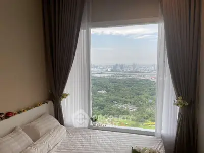 Luxurious bedroom with stunning city and park view through large window