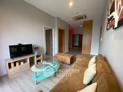 Modern living room with stylish furniture and contemporary decor in a spacious apartment.
