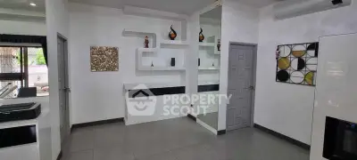 Modern living room with stylish decor and sleek shelving