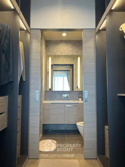 Luxurious modern bathroom with sleek design and elegant lighting