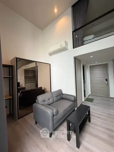 Modern loft apartment with high ceilings and stylish furnishings