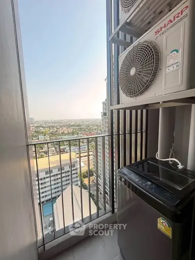 High-rise balcony with city view and air conditioning units, perfect for urban living.