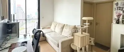Cozy living room with balcony view and modern furniture