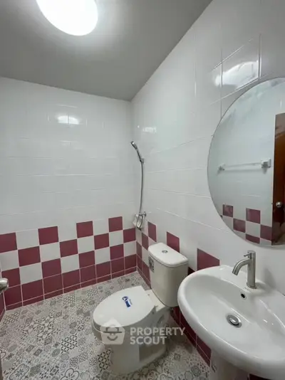 Modern bathroom with stylish tile design and sleek fixtures