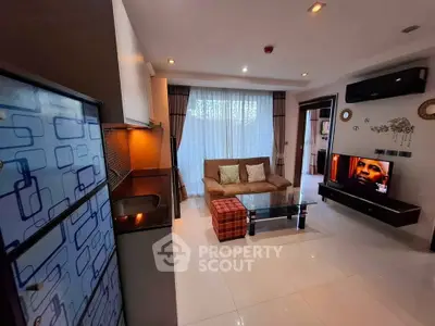 Modern living room with stylish decor and open kitchen layout