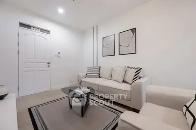 Modern living room with stylish decor and cozy seating area