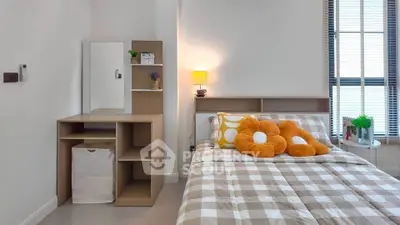 Cozy bedroom with stylish decor and natural light