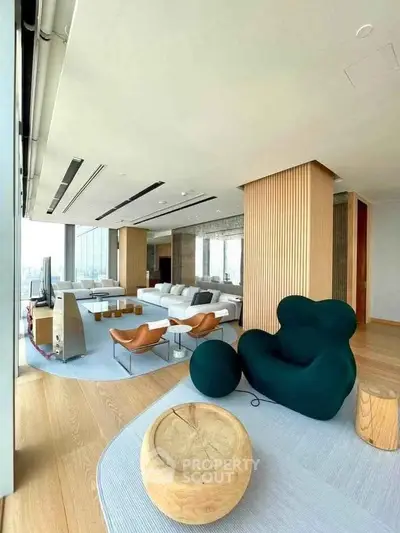 Luxurious modern living room with panoramic city views and stylish furniture