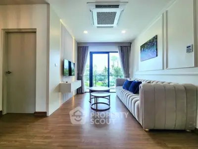 Modern living room with elegant sofa and large window view