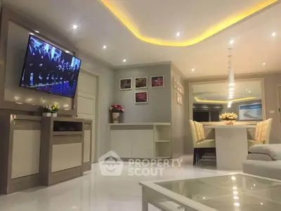 Luxurious modern living room with ambient lighting and sleek furniture design.