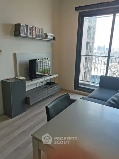 Modern living room with city view, sleek furniture, and natural light.